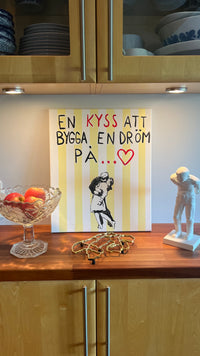 "En kyss att bygga en dröm på"
